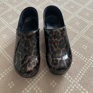 Dansko Leopard Print Patent Leather Clogs
